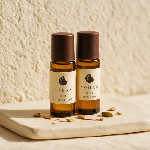 SOHAN № 01 and № 03 roll-on bottles side by side on unglazed cream ceramic